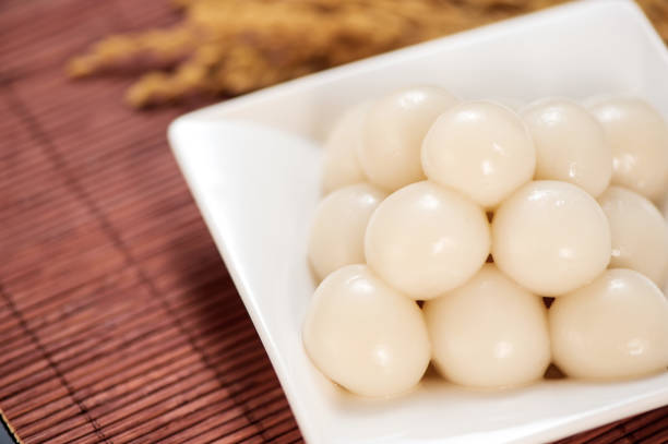 istock Japanese Dango dessert with 3 different color in pink(red), white, and green, recipe, hanami Dango, tsukimi Dango, copy space. 1016021064