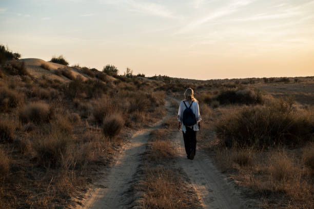 istock Western woman exploring Thar Desert in Rajasthan India 1016038376