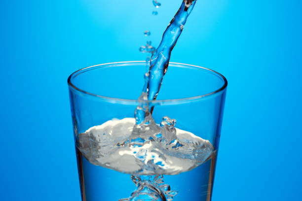 istock Beautiful splash of blue water 1016038560