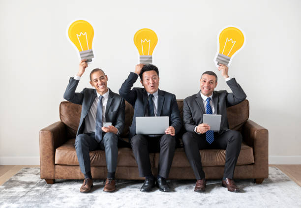istock Business people sitting together with icons 1016042420