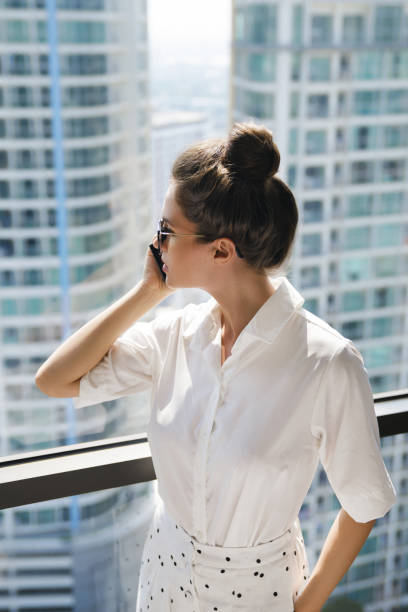 istock Young businesswoman using smartphone in her office 1016043676