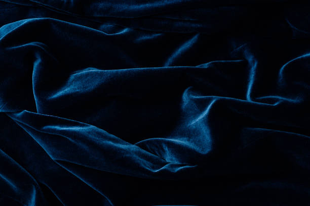 istock elevated view of dark turquoise velvet textile as background 1016049224