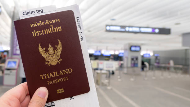 istock Holding passports and boarding pass 5 1016053002