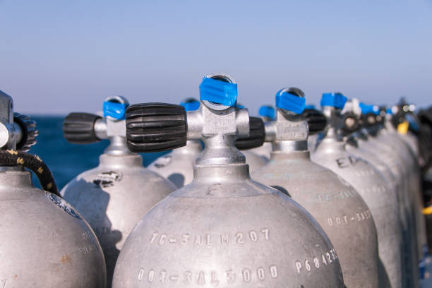 istock Rusty Anchors on Dive Boat Deck in the Sun with Sea in the Background 1016053166