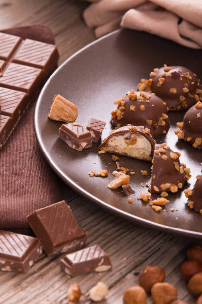 istock Chocolate truffles with caramel cream filling. 1016061384