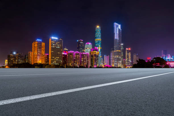 istock Urban road asphalt pavement and Guangzhou urban architecture 1016065512