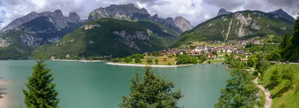 Village and lake Molveno at the foot of the Brenta Dolomites in western Trentino Alto Adige, Italy