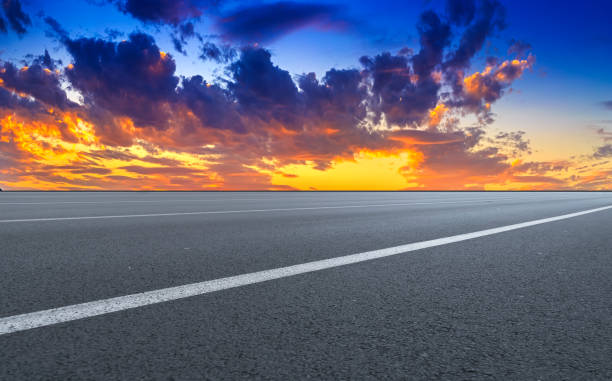 istock Asphalt road with sky clouds landscape 1016070976