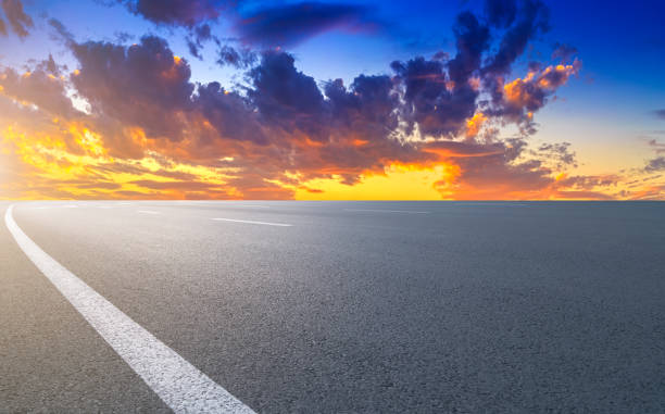 istock Asphalt road with sky clouds landscape 1016070994