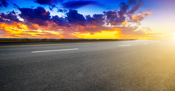 istock Asphalt road with sky clouds landscape 1016071326