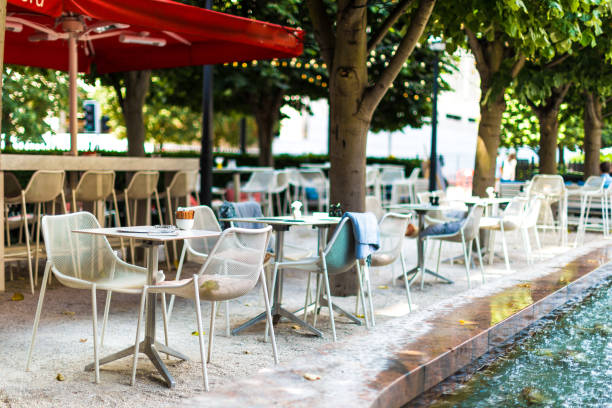 istock Chairs and tables at outdoors cafe terrace in London, UK 1016074586