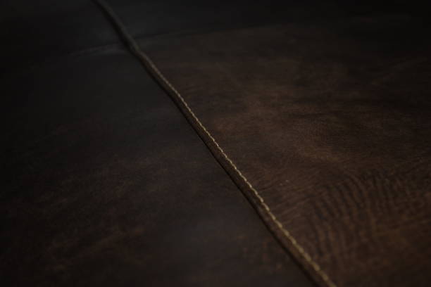 istock Seams of Brown Leather Sofa 1016077206