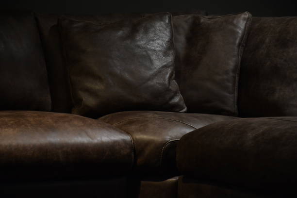 istock Brown Leather Upholstery of Sofa 1016077468