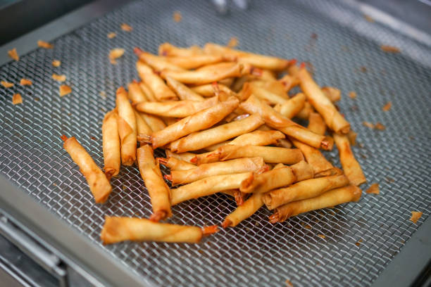 istock Deep-fried spring rolls are very popular throughout China and Southeast Asia, Thai or Vietnamese restaurant we usually order them as a starter. 1016078472