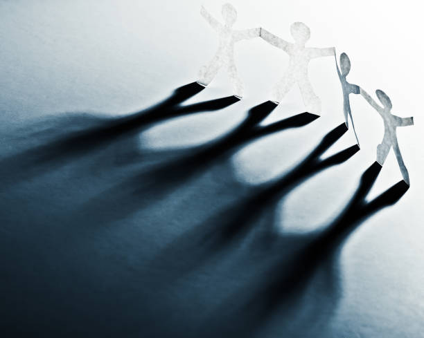 istock Paper people in teamworking concept 1016078560
