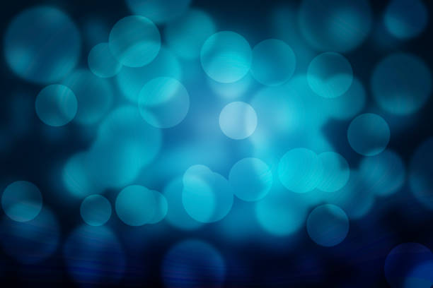 Abstract  background with bokeh refocused lights blue color.