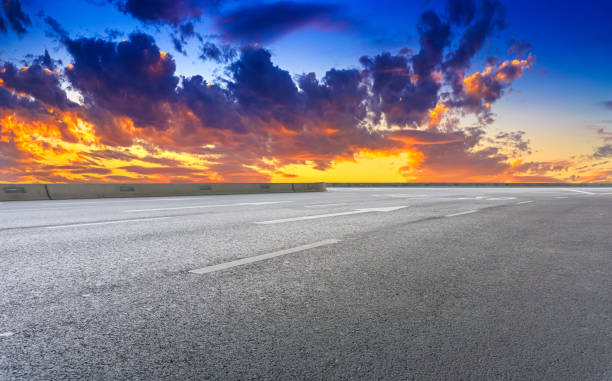 istock Asphalt road with sky clouds landscape 1016085156