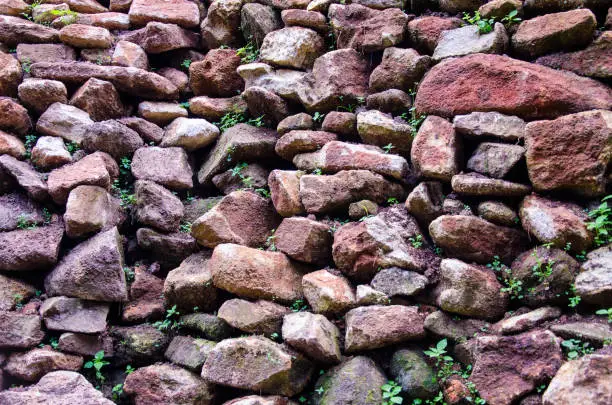 The stone walls are stacked together.