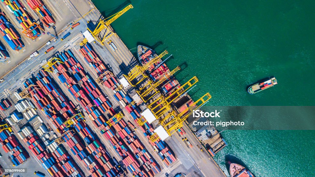 Top view Aerial view of  Deep water port with cargo ship and container Asia Stock Photo