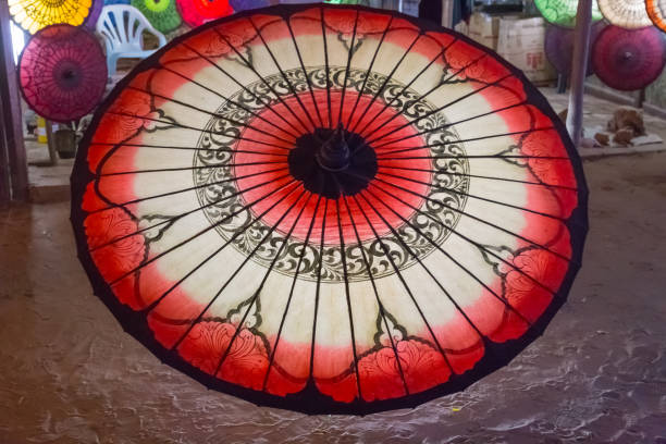 istock Souvenir shop sells typical umbrellas in Bagan, Myanmar 1016099476