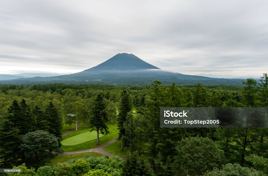 Beautiful Mountain with golf field in cloudy day look from viewpoint Niseko Stock Photo