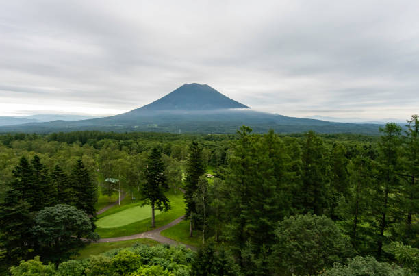 Beautiful Mountain with golf field in cloudy day look from viewpoint stock photo
