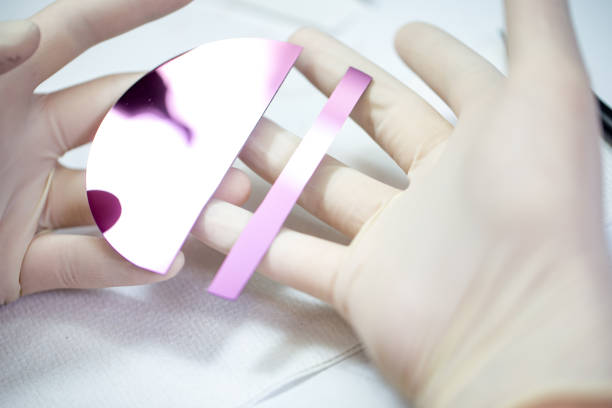 istock Researcher Holding Silicon Base for Graphite Particles 1016112684