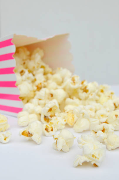 istock Fresh Popcorn Falling out of Discarded Box 1016119124