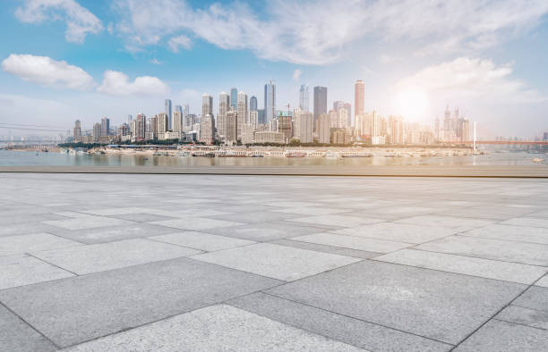 istock Chongqing city skyscrapers with empty square floor tiles 1016119398
