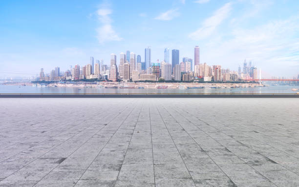 istock Chongqing city skyscrapers with empty square floor tiles 1016120098