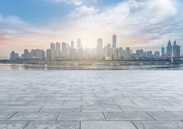 istock Chongqing city skyscrapers with empty square floor tiles 1016121128