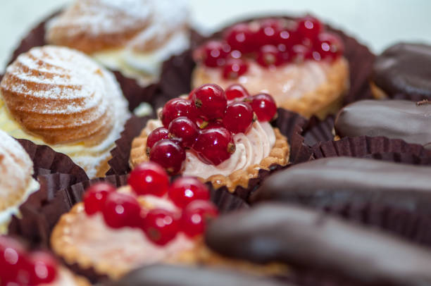 istock Cupcake with cream and fruits 1016128082