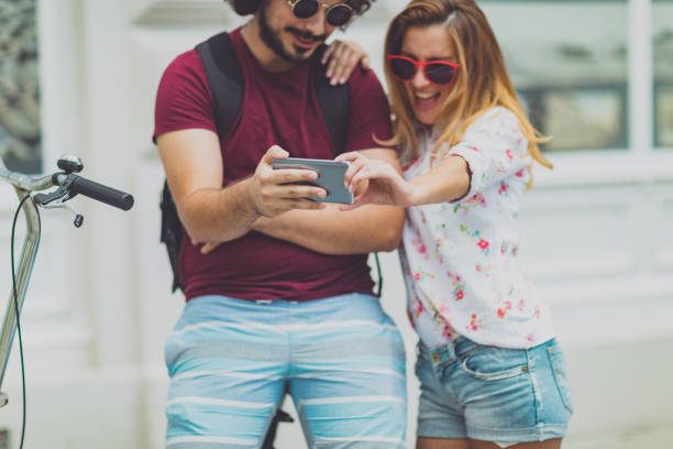 istock Happy young couple taking a selfie 1016128318