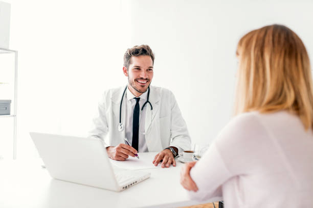 istock Woman having a doctor appointment 1016129006