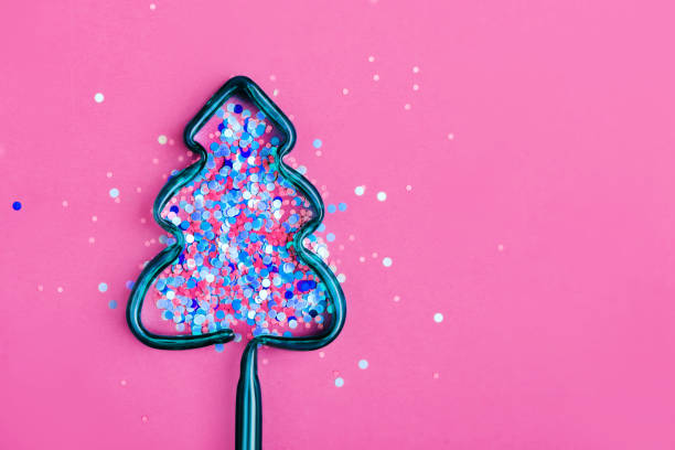istock Christmas tree made of colorful confetti. 1016133884