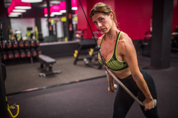 istock Woman workout in the gym 1016134776