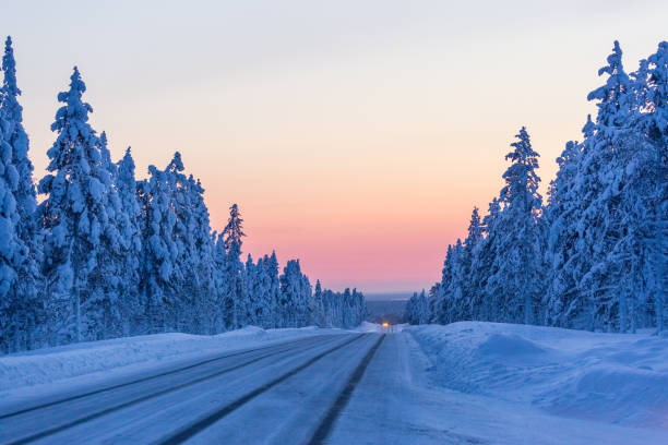 istock Evening on the winter road in Finland 1016157202
