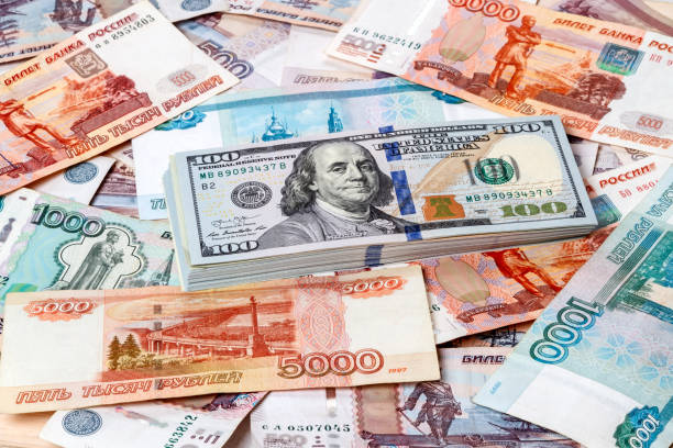 istock Dollars against the background Russian money 1016180916
