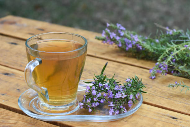 istock Cup of  fresh natural tea on wooden table 1016183908