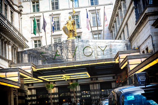 London, England - June 16, 2017: View of the entrance of the luxury The Savoy hotel near Strand in London