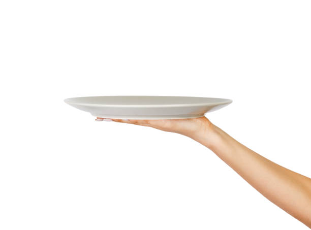 istock human hand with blank plate isolated on white background. perspective view, isolated on white background 1016186732