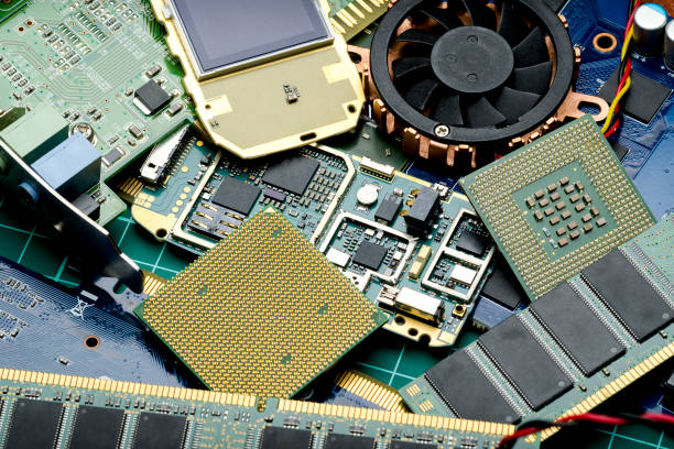 istock Electronic boards and microchips for spare parts and recycling 1016189452