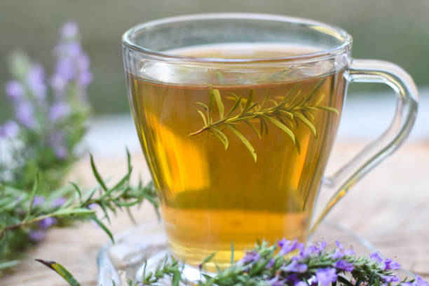 istock Cup of  fresh natural tea on wooden table 1016189598