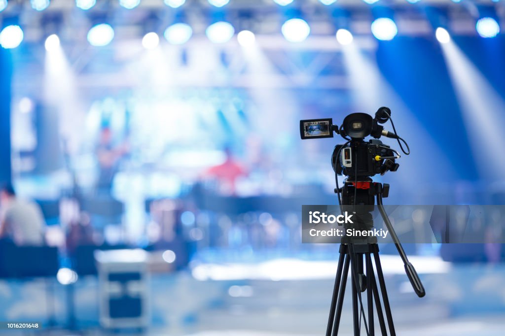 Tv camera in a concert hall Movie Stock Photo