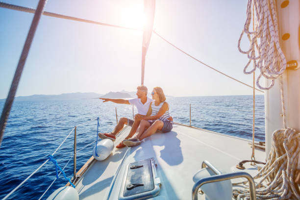 istock Young couple relaxing on the yacht 1016216890