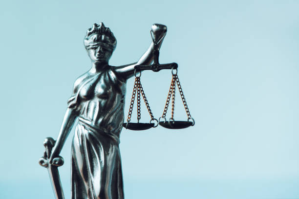 istock Lady Justice statue in law office 1016217442