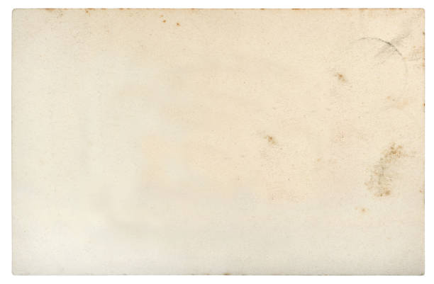 istock Used paper sheet edges Old cardboard stains white background 1016223252