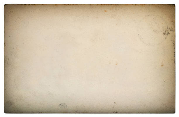 istock Used paper sheet vignette white background 1016223262