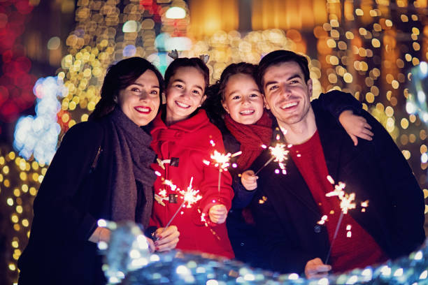 istock Happy couple is holding fireworks at Christmas 1016223572