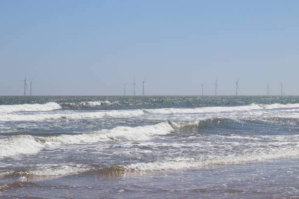 istock Wind turbines in sea 1016223728
